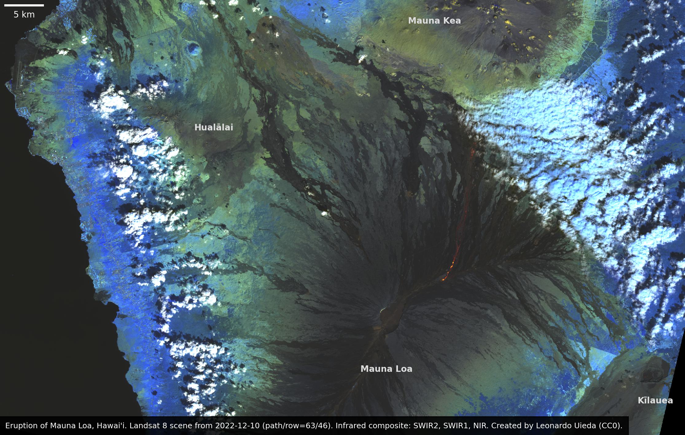 Scene from 2022/12/10. The volcano is still surrounded by clouds and with the current lava flows showing up as a thin strip of light red and green. The main crater is no longer slight red and the northern tip of the lava flow is covered in clouds and therefore hard to make out.